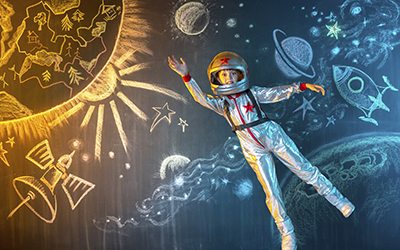 Flying in space child dressed as an astronaut