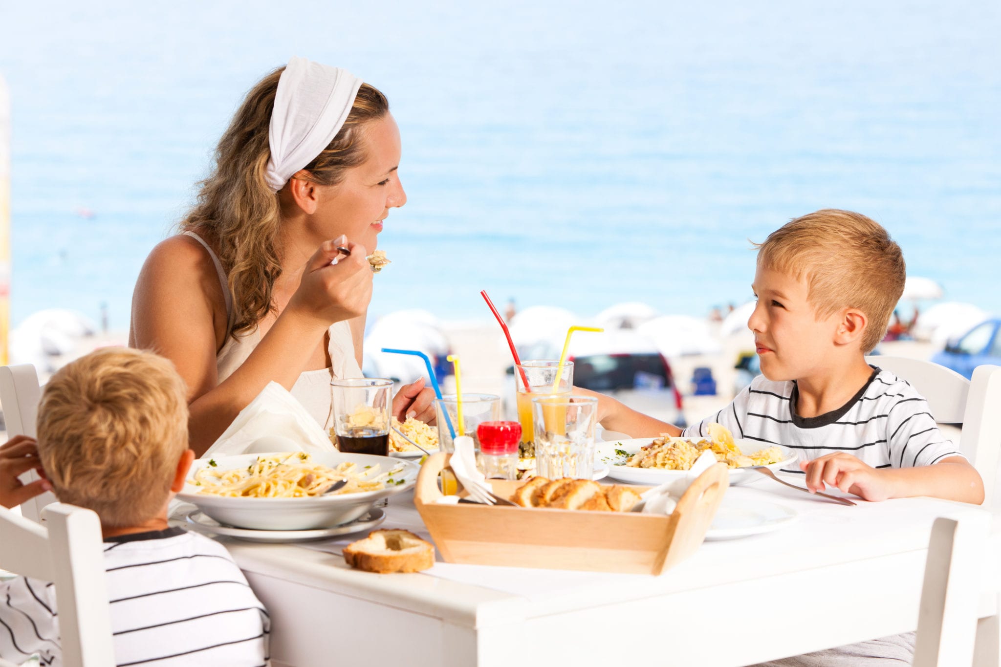 Family enjoying a restaurant near Sea Crest Resort