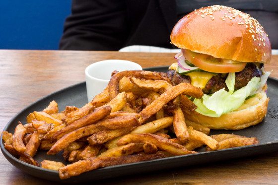 A plate of fries and a burger at one of the best new restaurants in Myrtle Beach.