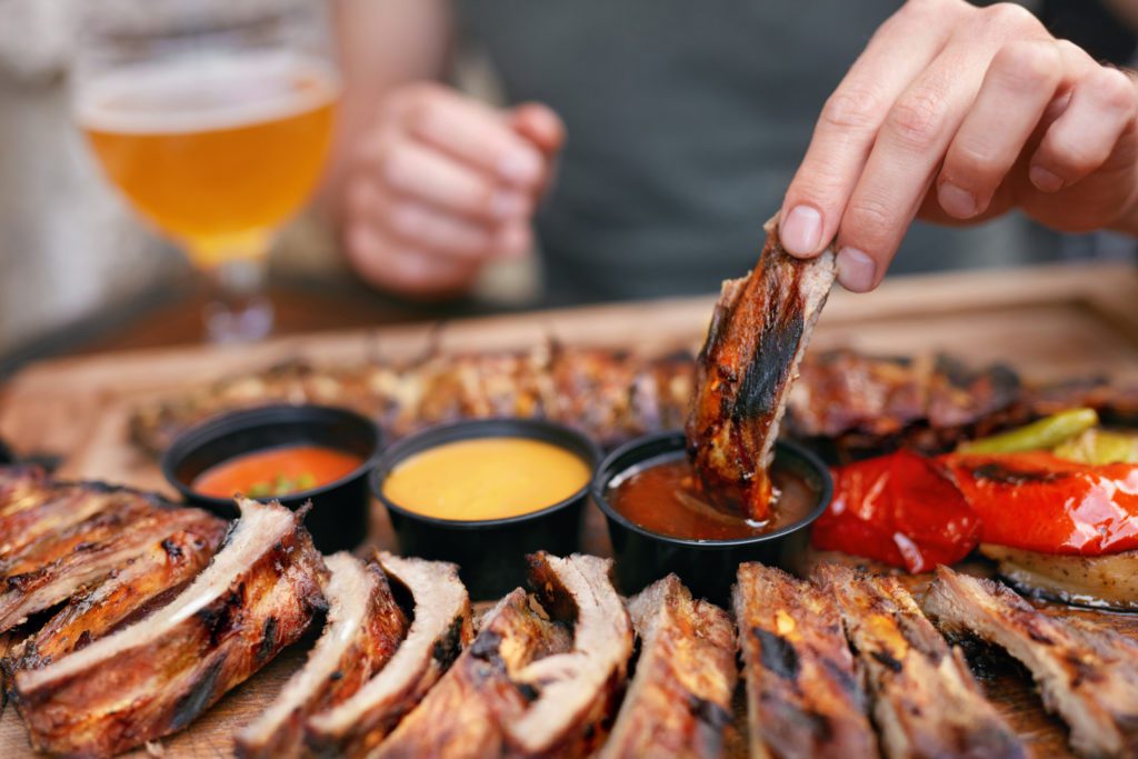 the best bbq in myrtle beach offers a variety of sauces with your ribs.