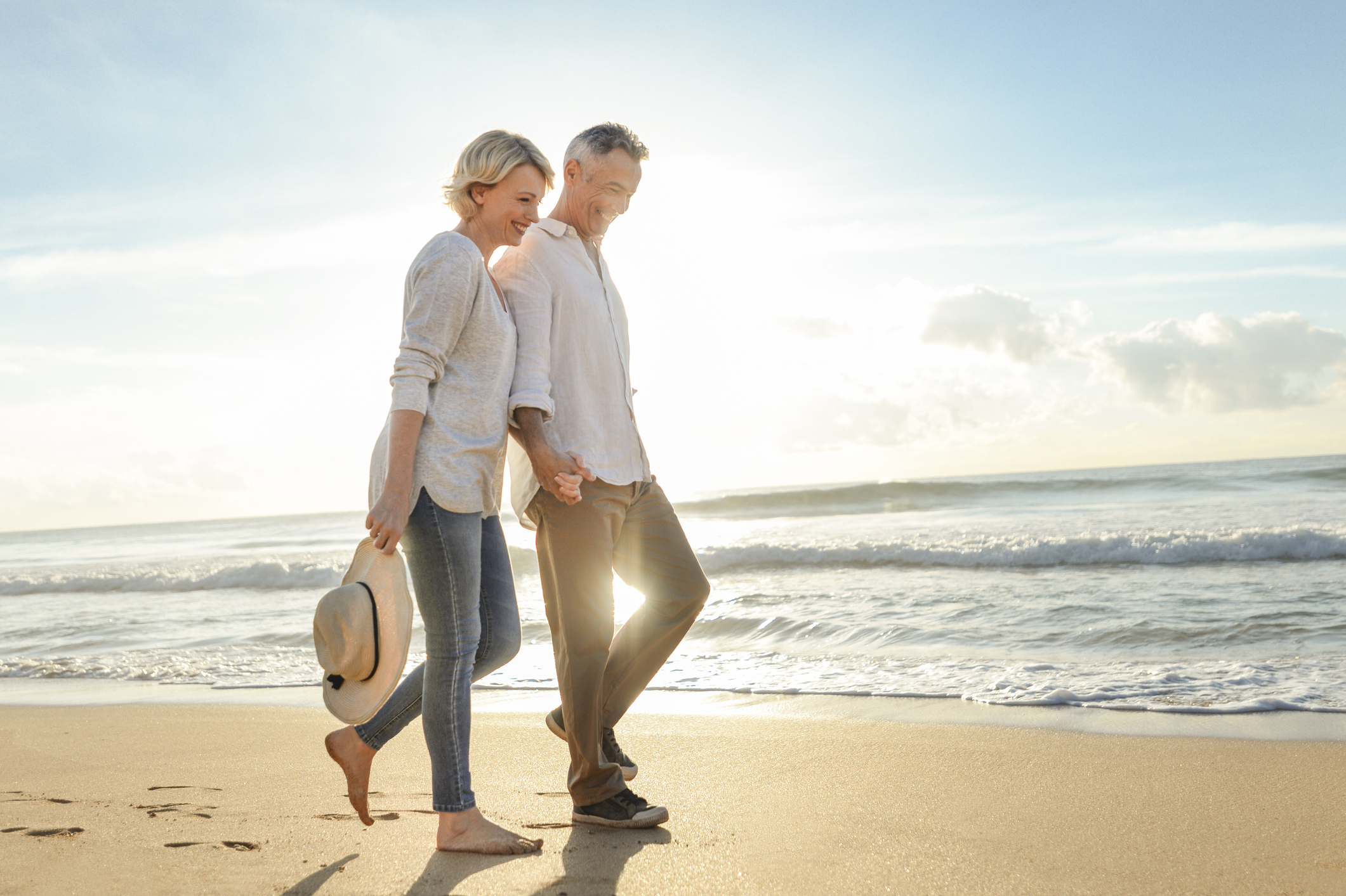 Couple strolling on the beach - Myrtle Beach Attractions for Couples
