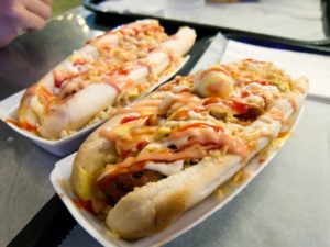 loaded hotdogs at baseball game