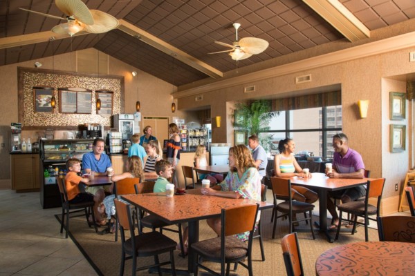 People enjoy the coffee shop at Sea Crest Resort