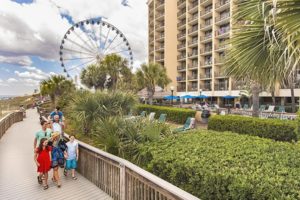 family on the myrtle beach boardwalk